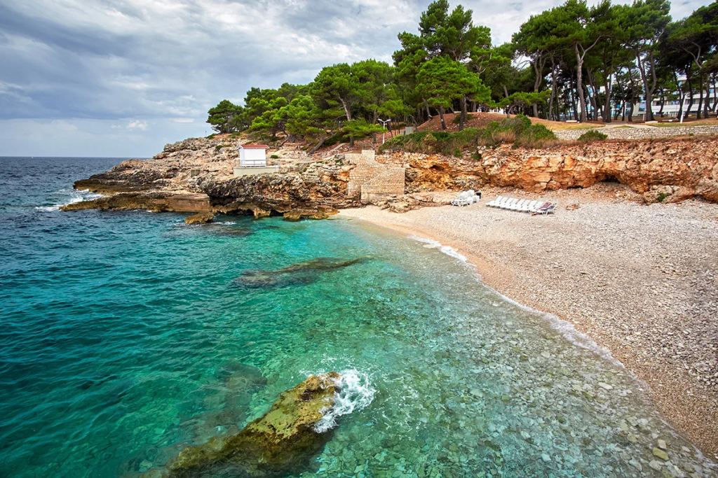 A serene coastal tour showcasing the beauty of Pula beaches.